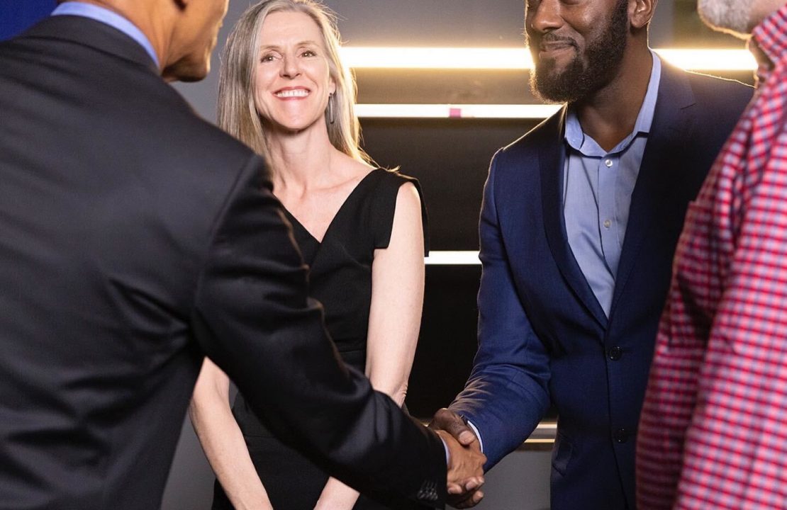 Charles Daniels shaking hands with President Barack Obama