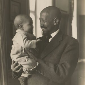 W.E.B. Du Bois w/ child
